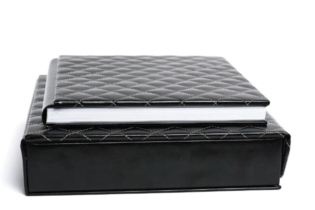 Spagnolo Photography's handcrafted leather-bound layflat heirloom album that is part of certain wedding photography packages, and can be added to others.