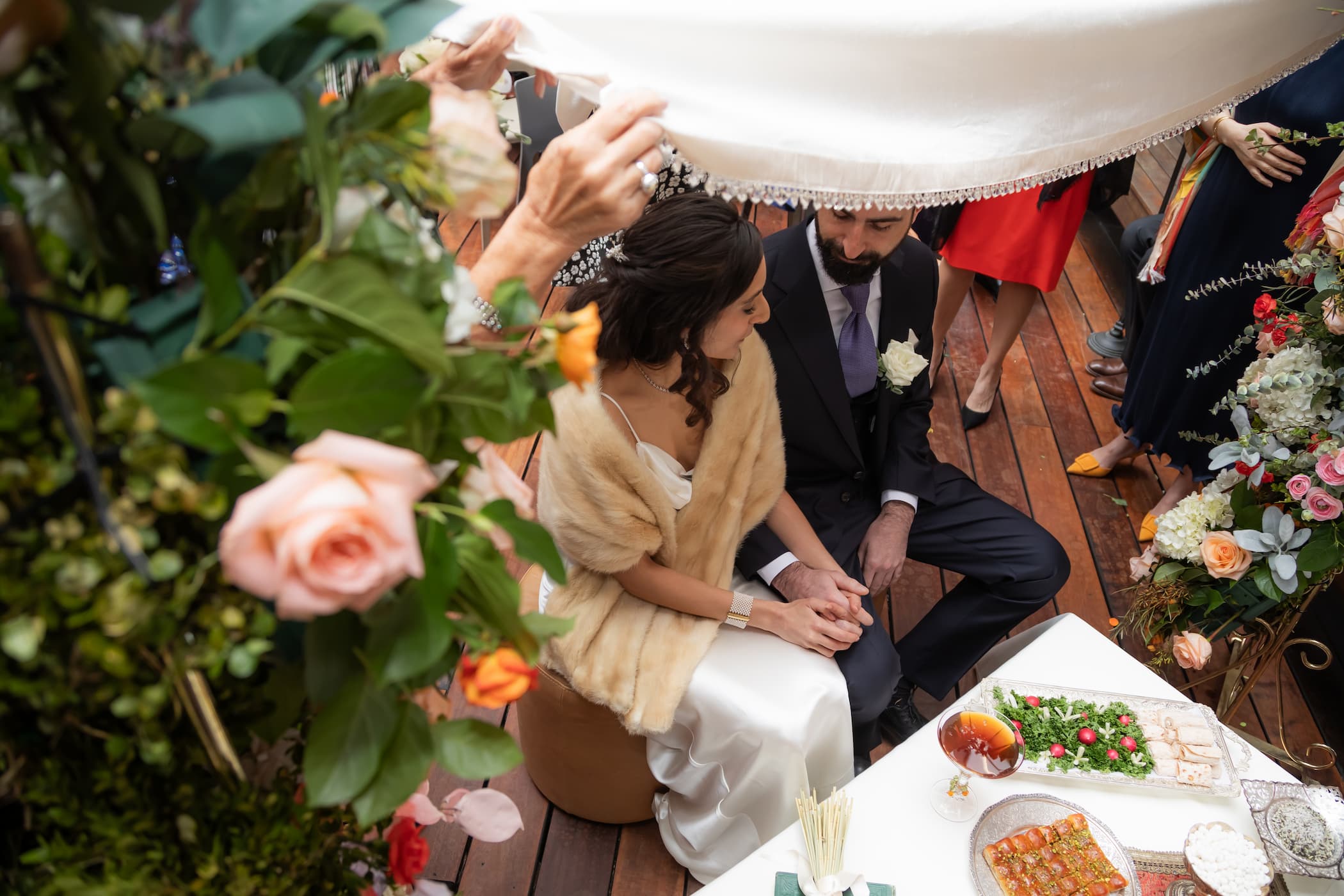 A bride and groom during a traditional Persian wedding at SRV Boston - photographed by Spagnolo Photography as part of the couple's micro-wedding photography package.