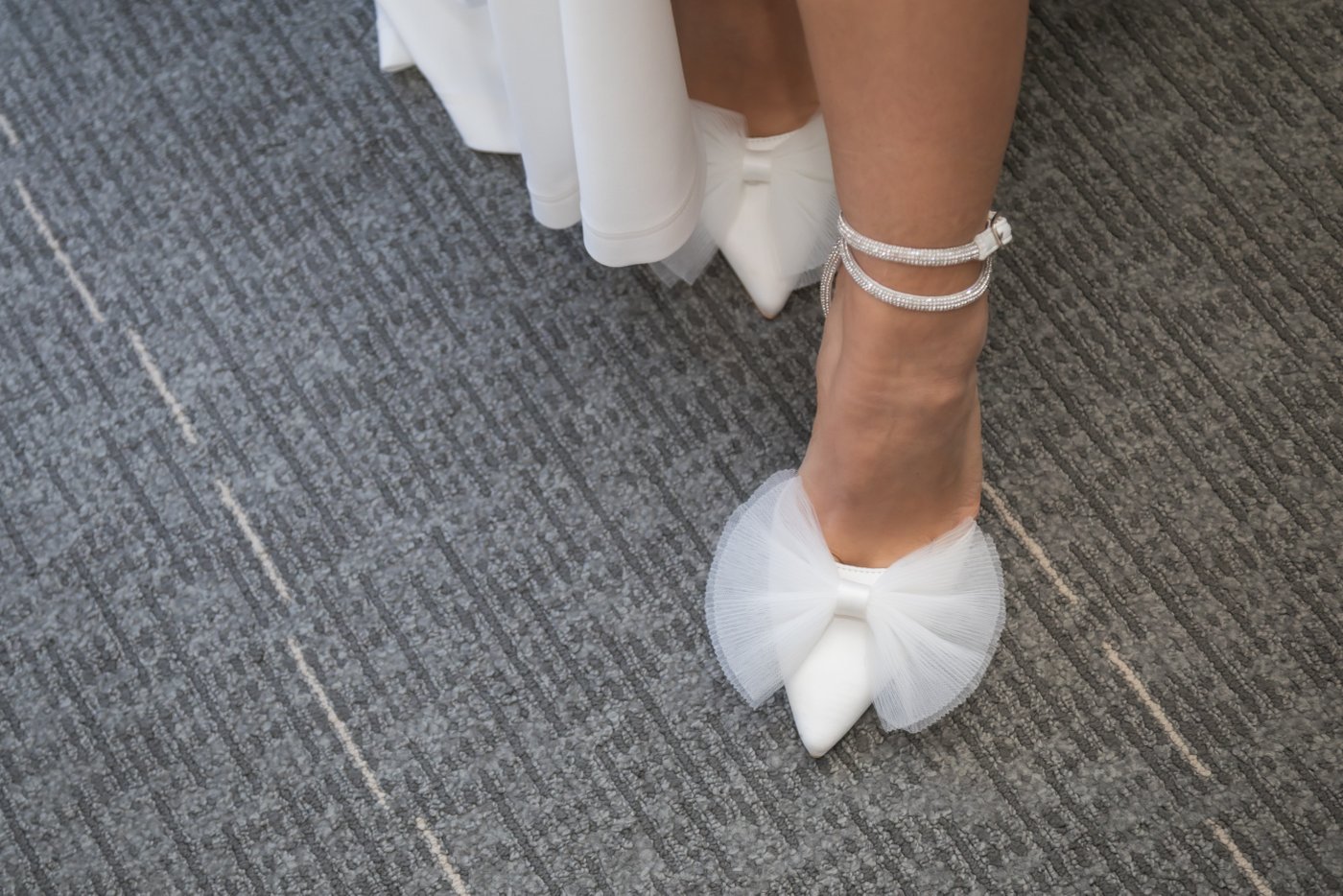 A close up shot of the bride's shoes