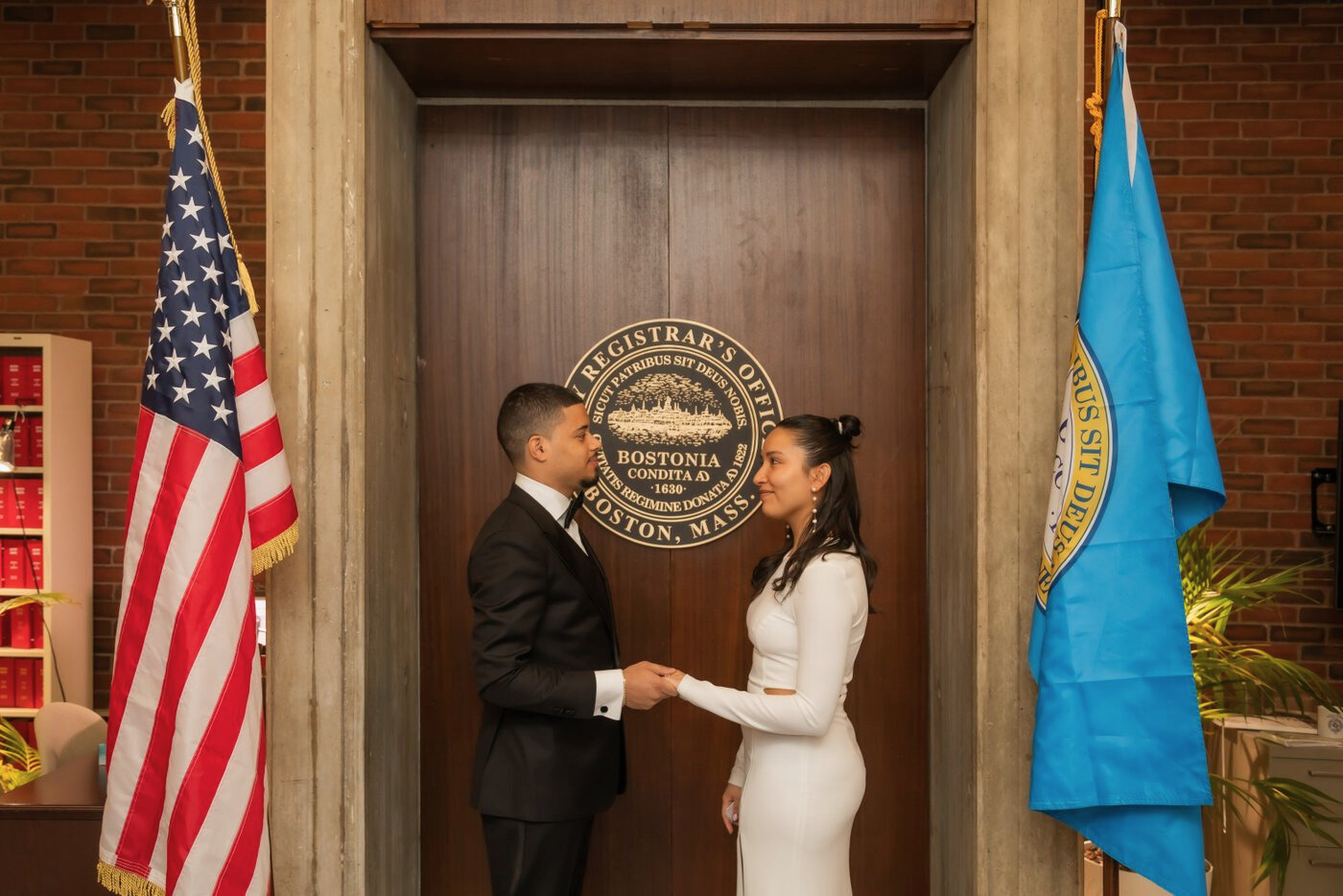 Bride and groom getting married at Boston City Hall