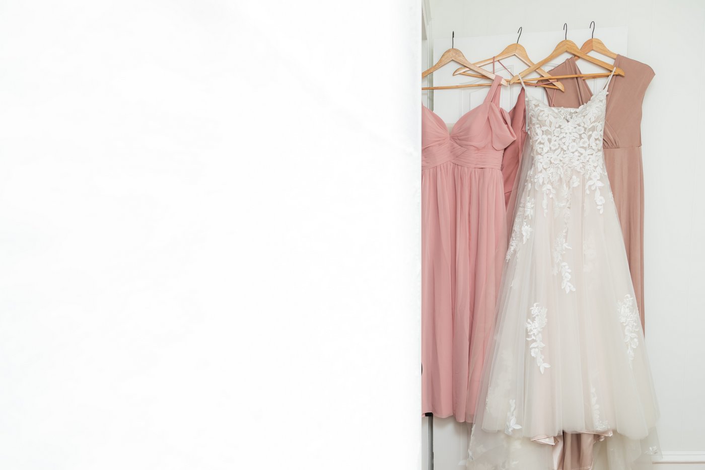 A detail shot of the bride's and bridesmaids' dresses
