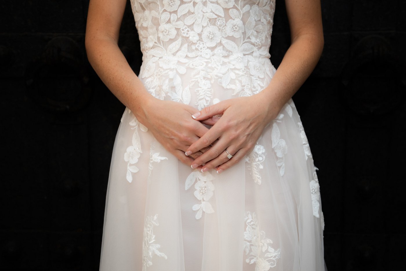 A close-up shot of the bride's hands before her Hammond Castle wedding