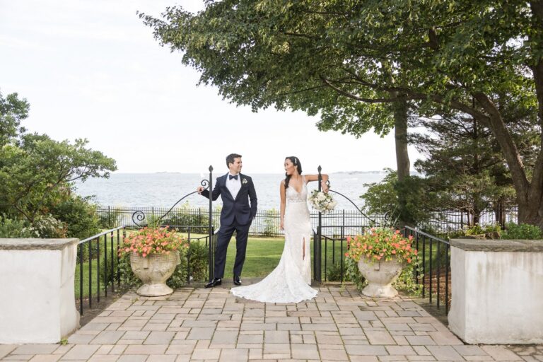 Portrait of bride and groom on their wedding day at the Misselwood Estate with sweeping ocean views in the background