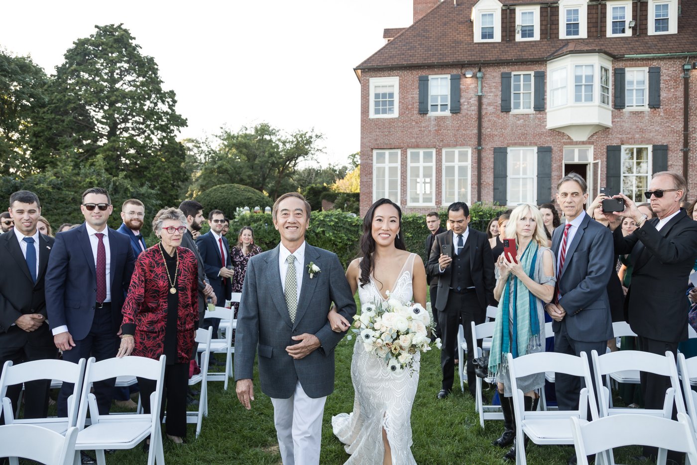 Bridal march at outdoor wedding ceremony at Misselwood Estate in Beverly MA