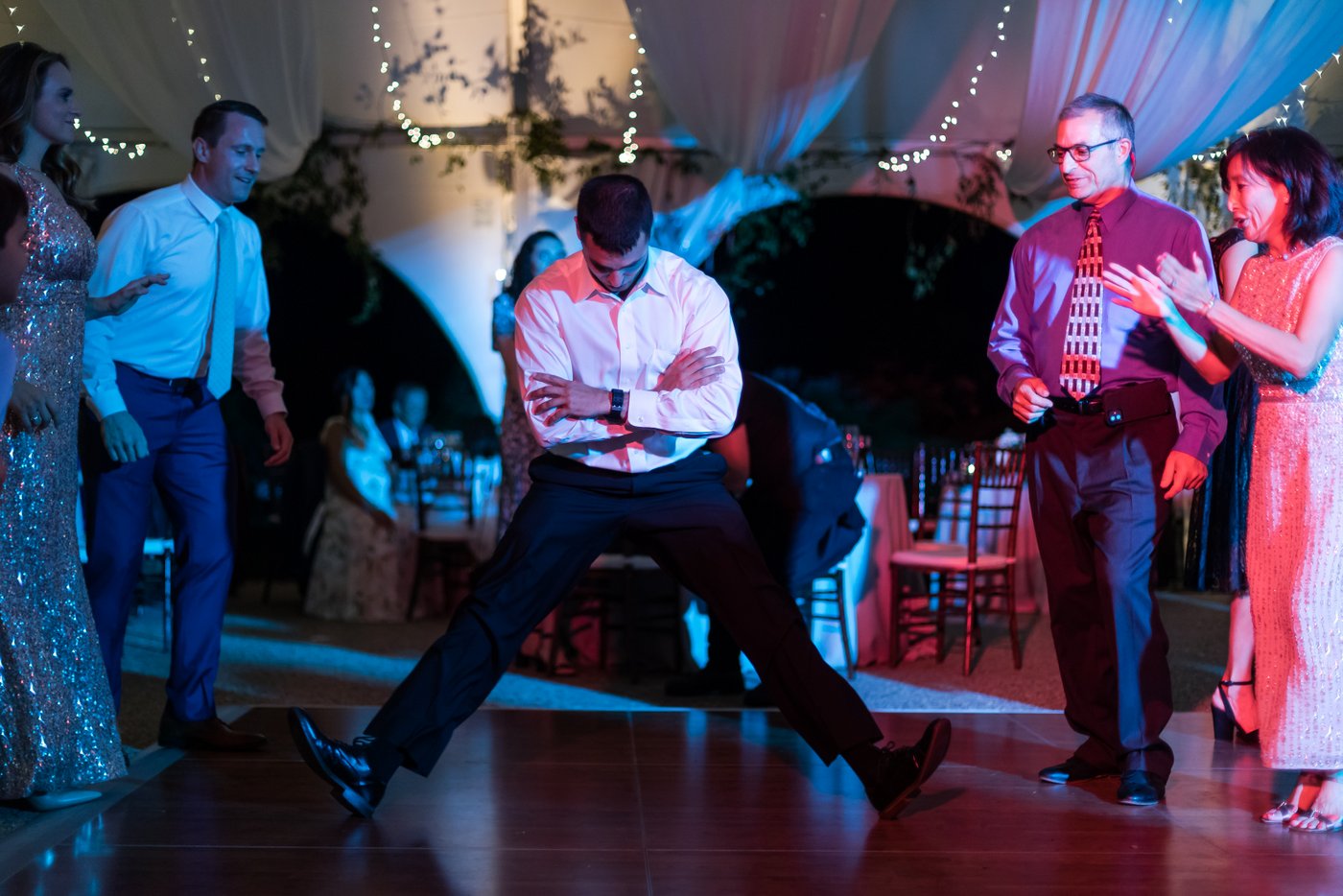 Lively dance party at oceanfront Misselwood Estate wedding reception
