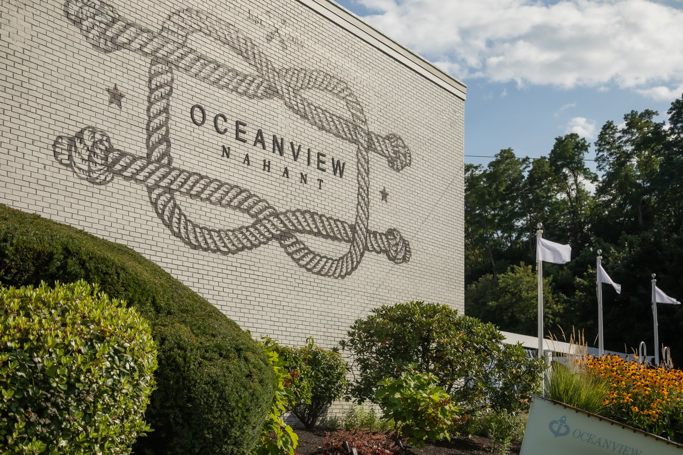 The facade of Oceanview of Nahant on a sunny summer day
