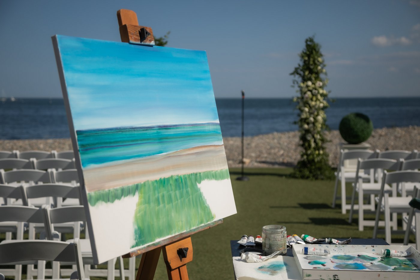 The live painter's canvas as he begins painting the scenery before the wedding ceremony at Oceanview of Nahant