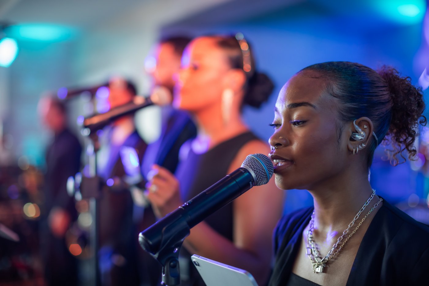 The band "The Connection" singing at Oceanview of Nahant during wedding reception