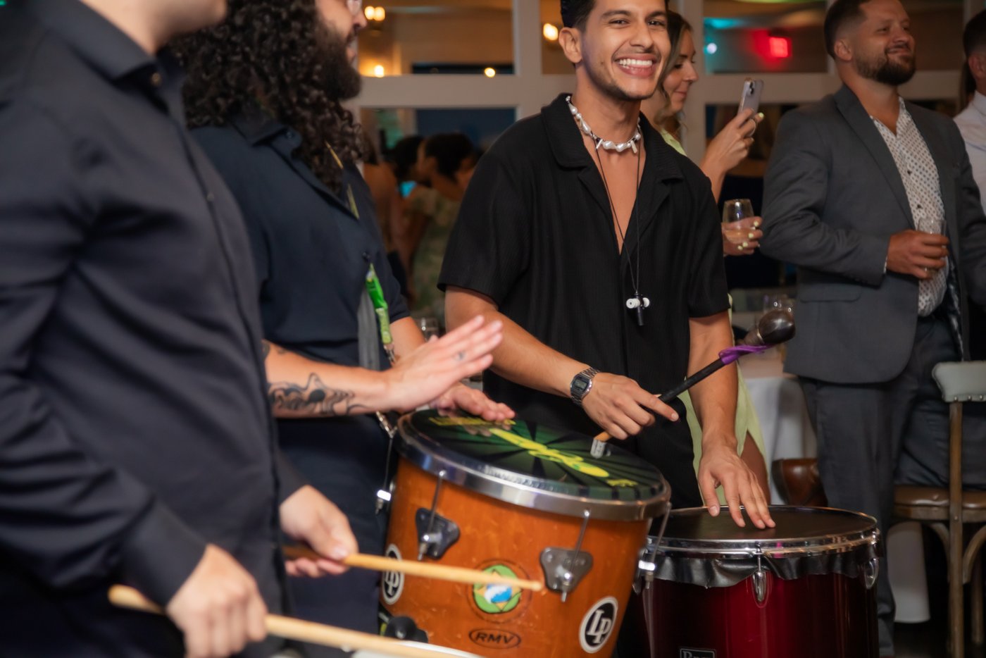 Brazilian-style drummers entertain guests during a high-energy wedding reception at Oceanview of Nahant.