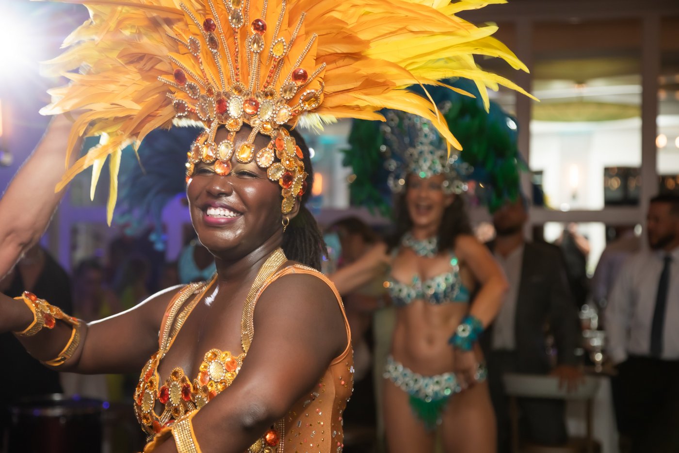 Brazilian samba dancers perform during a vibrant wedding reception at Oceanview of Nahant on the North Shore of Massachusetts.