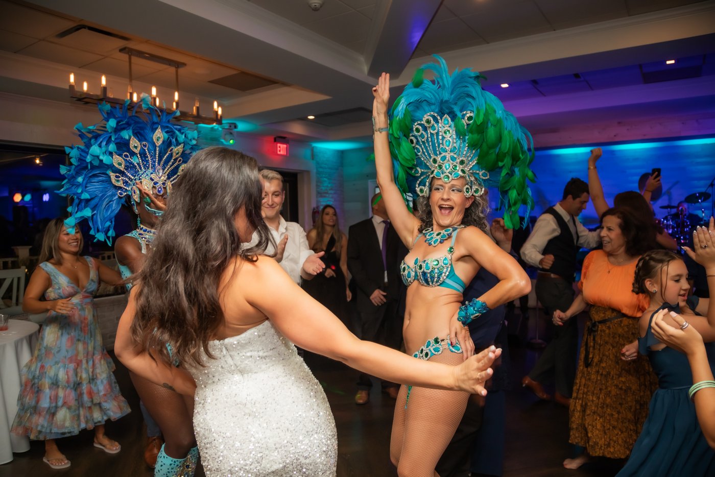 The bride dances with a Sambaviva samba dancer at the Oceanview of Nahant wedding