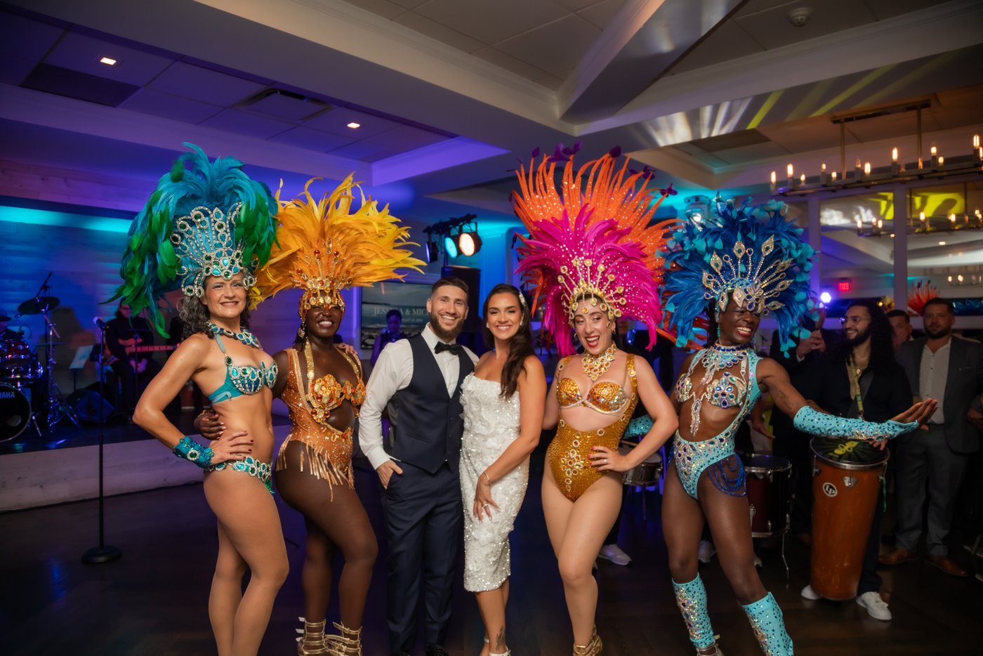 Sambaviva Samba dancers pose with the bride and groom during the wedding reception at Oceanview of Nahant.
