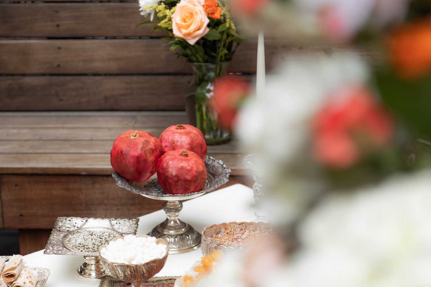 Pomegranates on the Persian sofreh aghd table at SRV Boston.