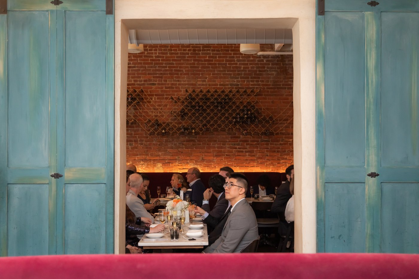 Guests eat dinner at an SRV Boston wedding reception.