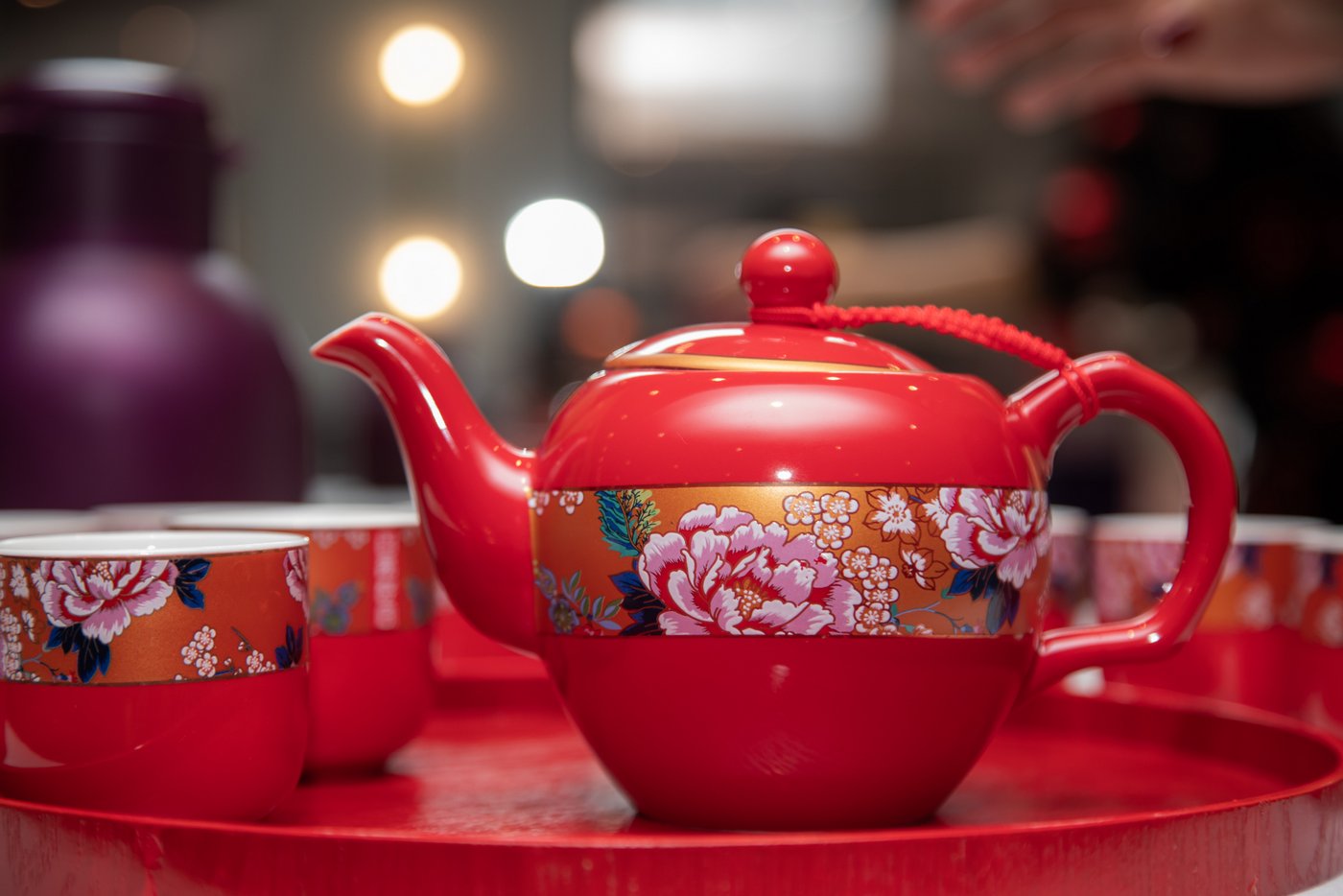 The red tea pot and tea cups for the Chinese tea ceremony at the State Room in Boston