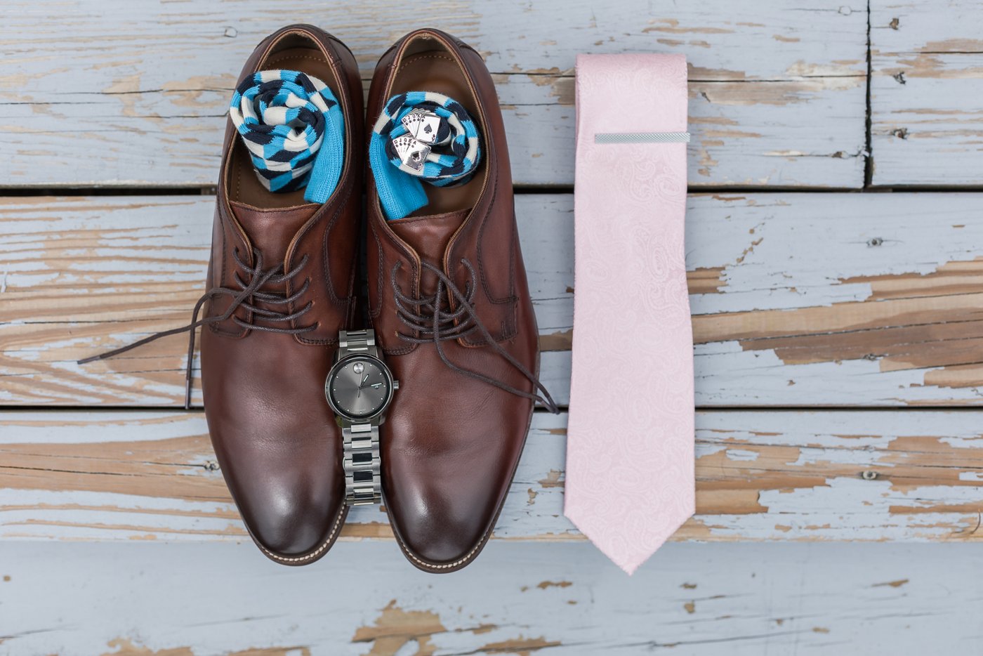 The groom's personal items arranged neatly