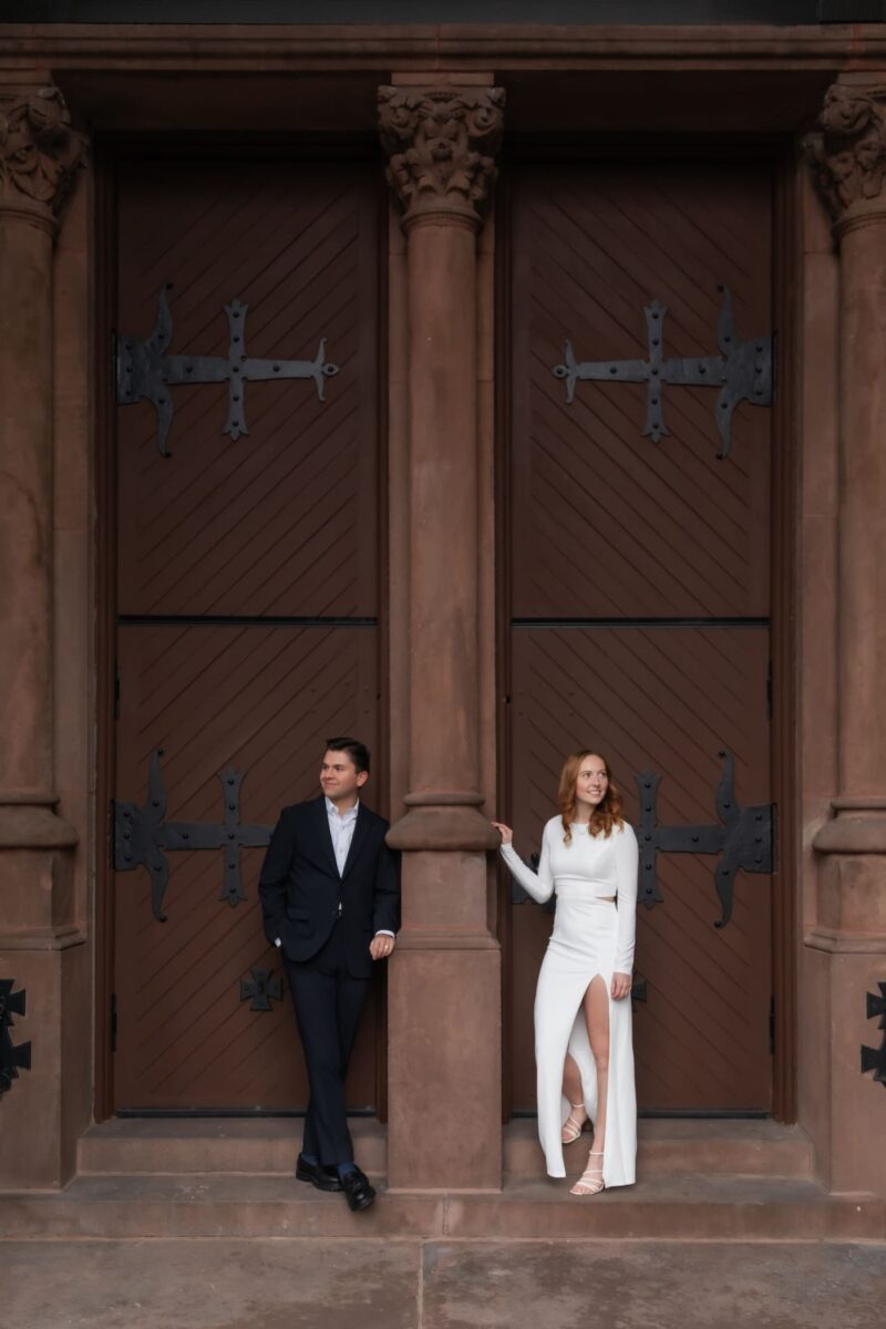 A bride and a groom near the Boston Public Library, where they renewed their vows as part of the library's 1-hour wedding ceremony package, photographed by Boston elopement photographers Spagnolo Photography--the couple's photo is highlighted as one of around 40 featured weddings and elopements Spagnolo Photography covered in 2025.
