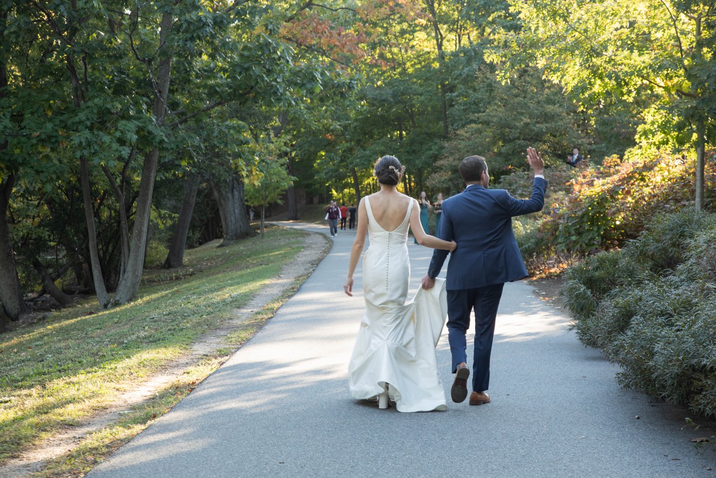 Bride and groom portrait at the Riverway Park in Brookline during their fall wedding in Brookline.