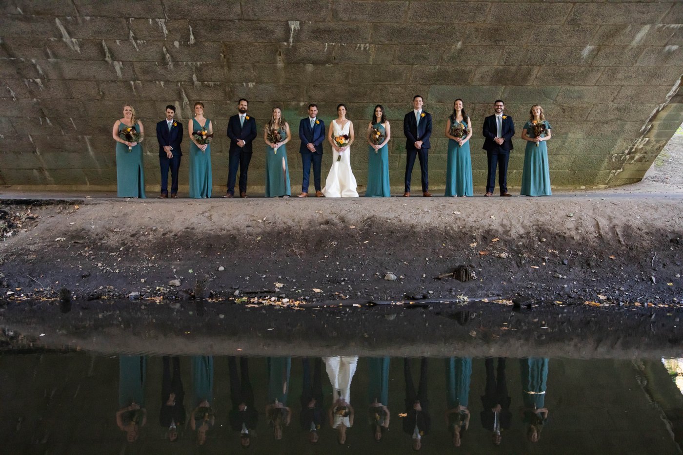 Bridal party portrait at the Riverway Park in Brookline during a fall wedding in Brookline.