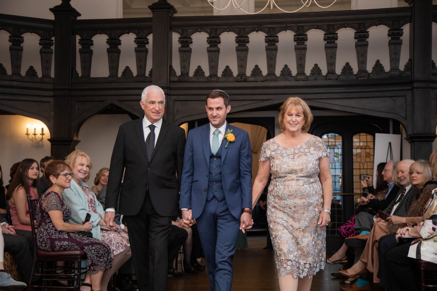 Groom processional with his parents at Alden Castle fall wedding in Brookline MA