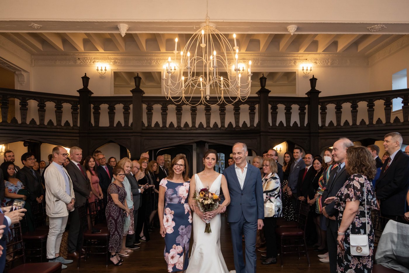 Bride walking down the aisle at fall wedding in Brookline.