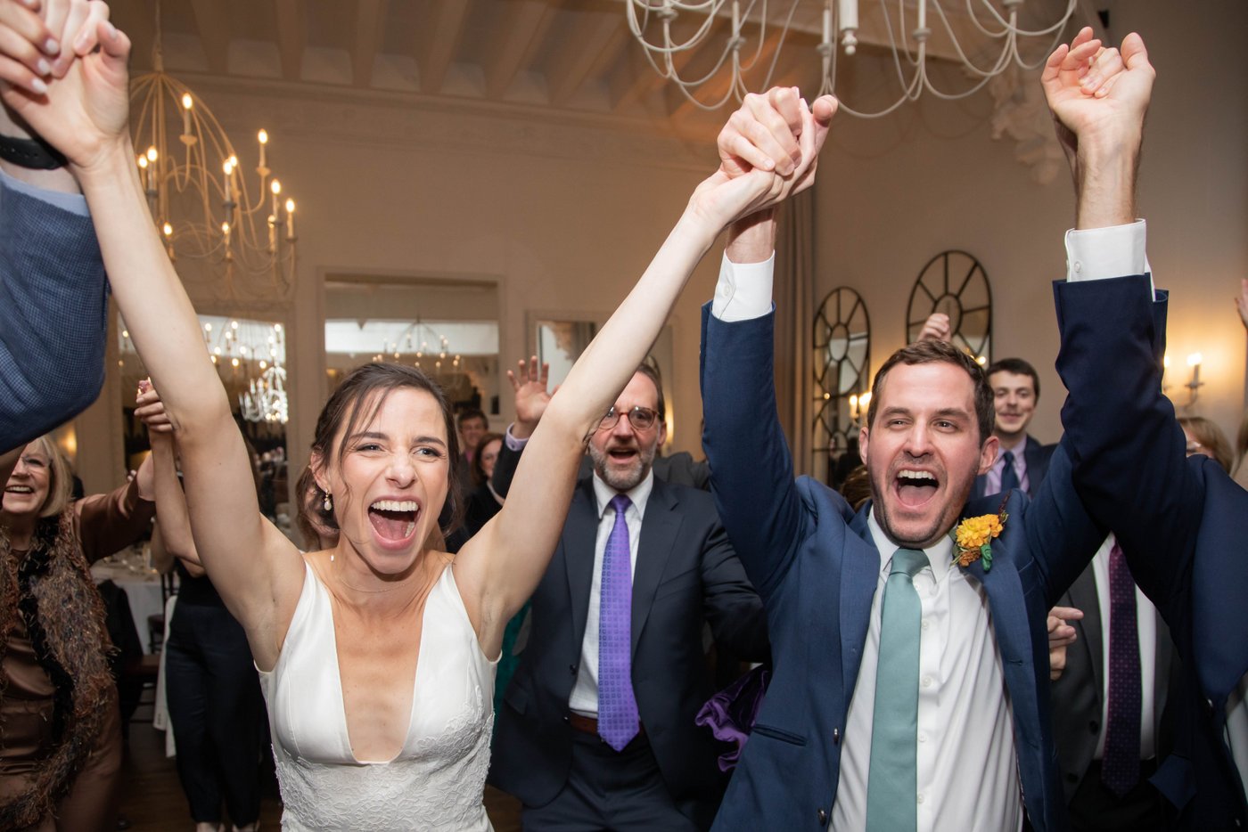 Bride and groom dancing the Horah at fall Jewish wedding in Brookline