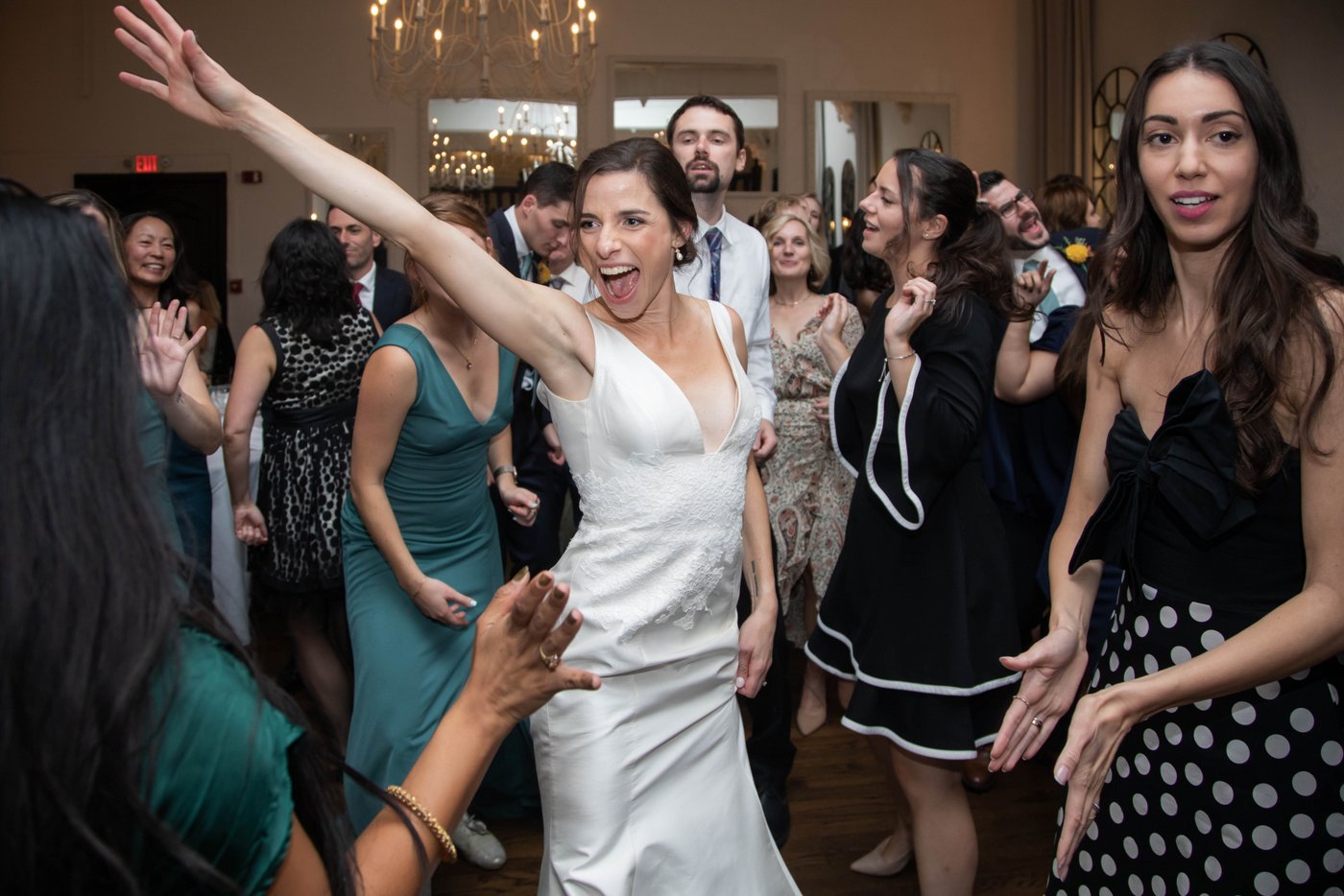 The bride dancing at fall wedding in Brookline