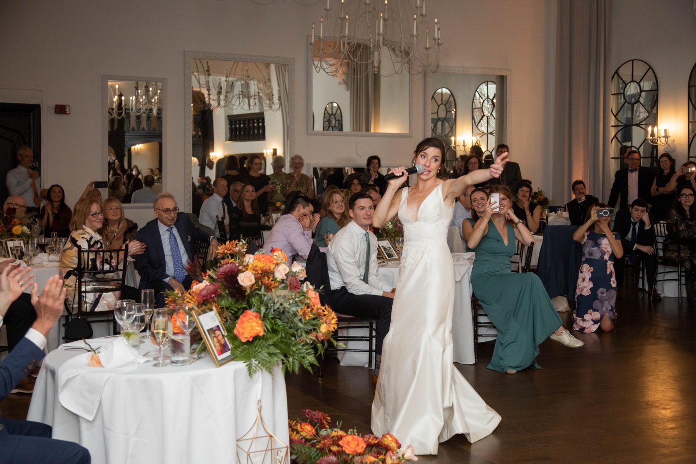 Bride singing a hip hop song at fall Jewish wedding in Brookline MA