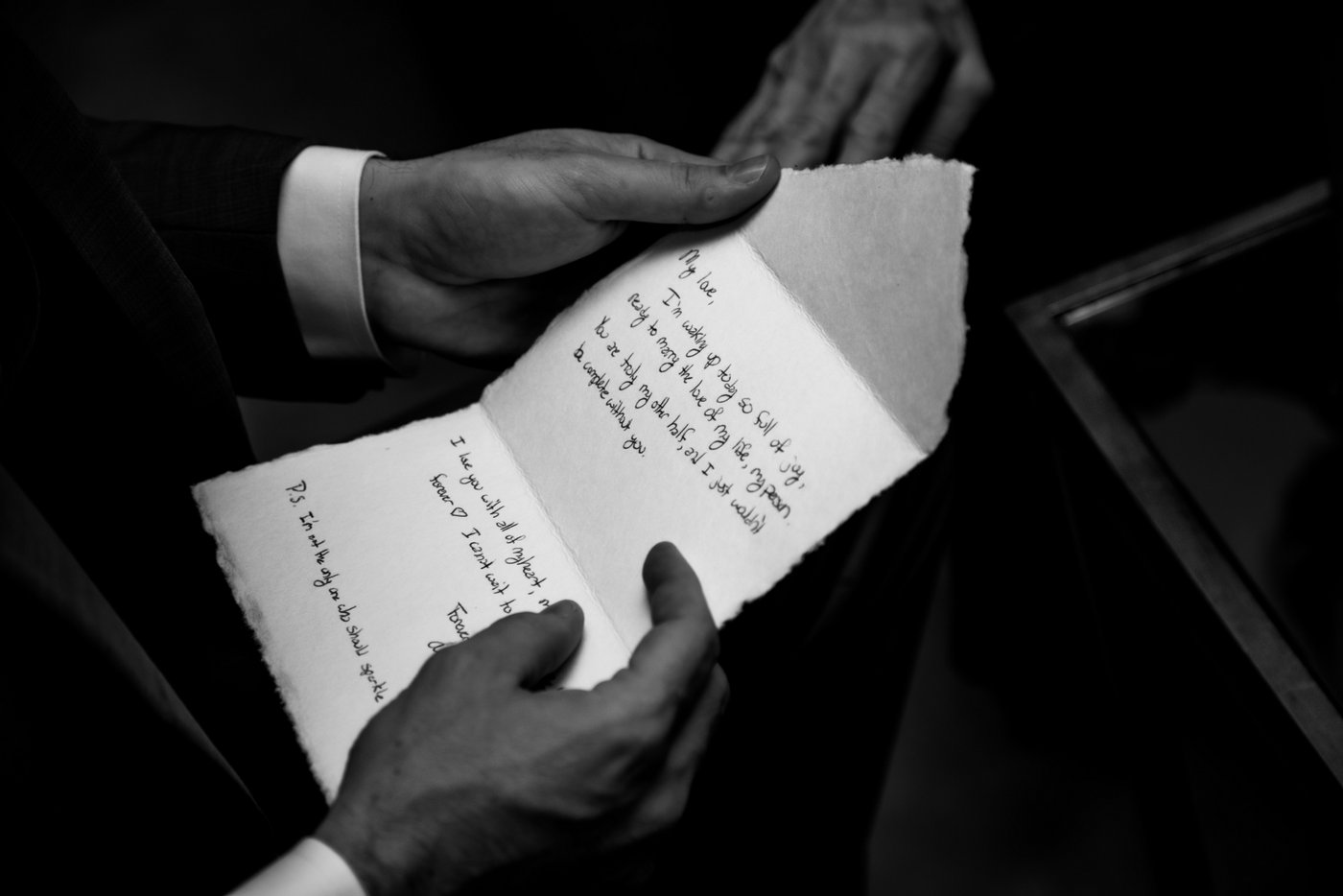 A black and white photo of the bride's letter to the groom