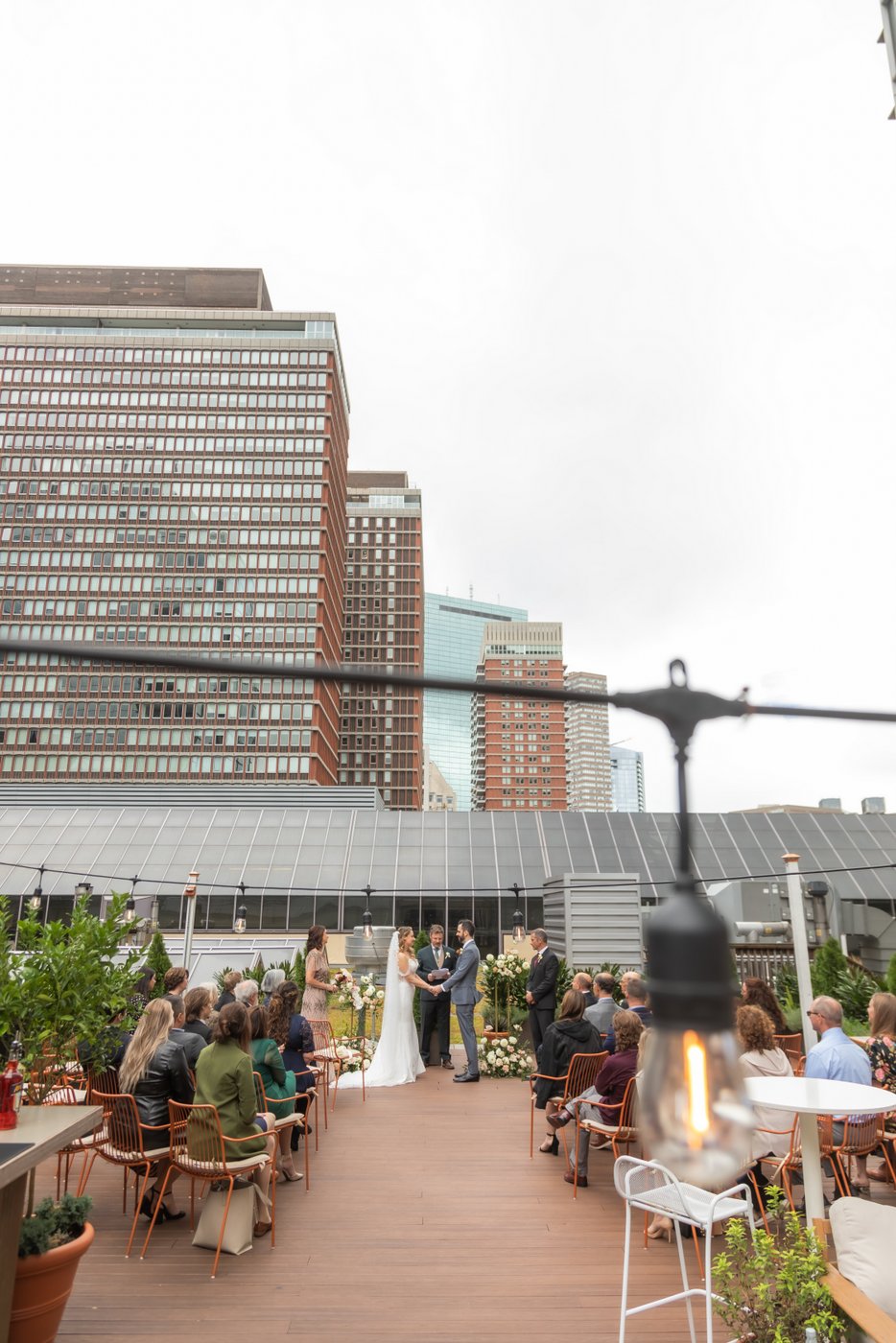 A scene from the rooftop micro wedding ceremony at Terra at Eataly in Boston