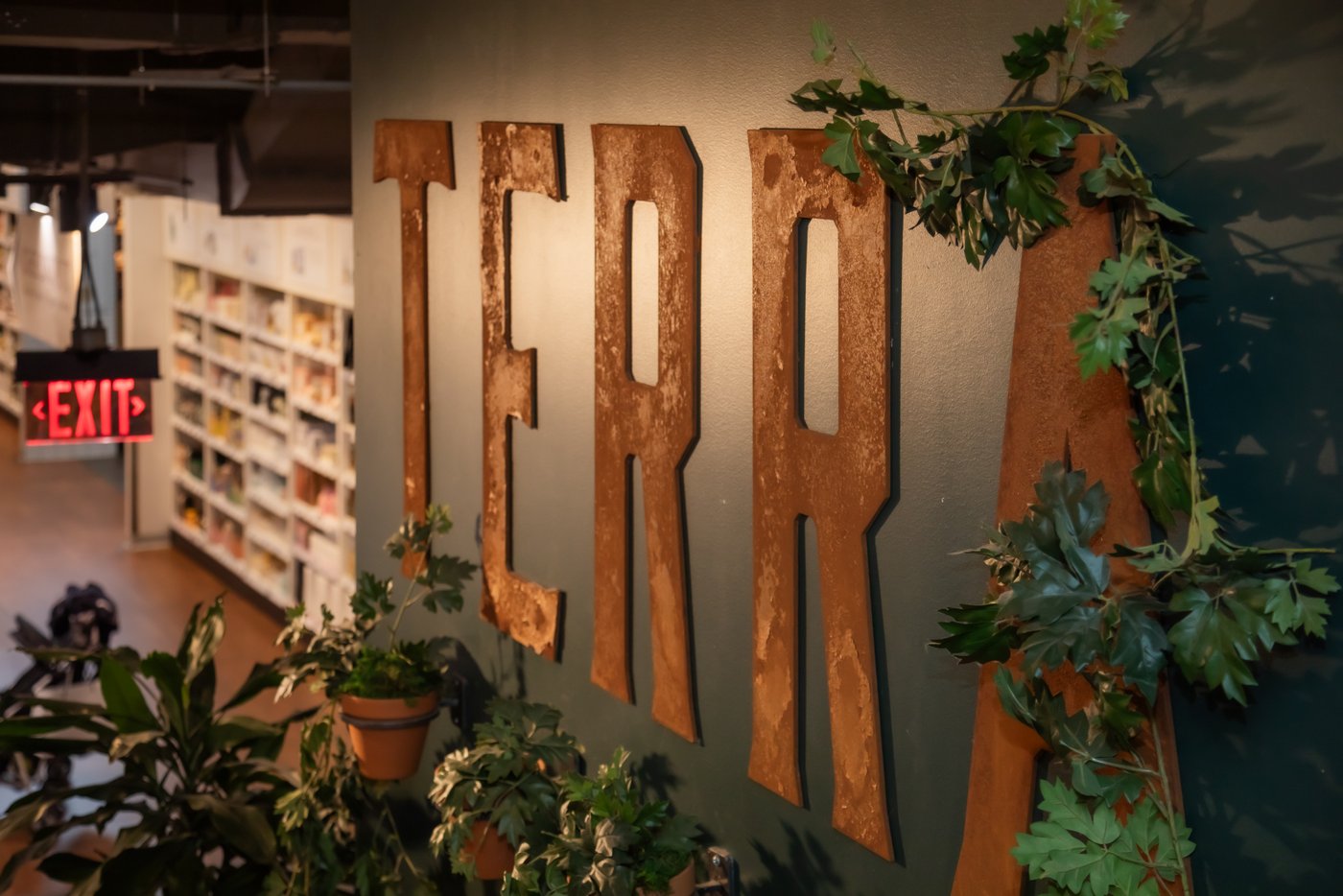 The large "Terra" sign inside Terra at Eataly in Boston