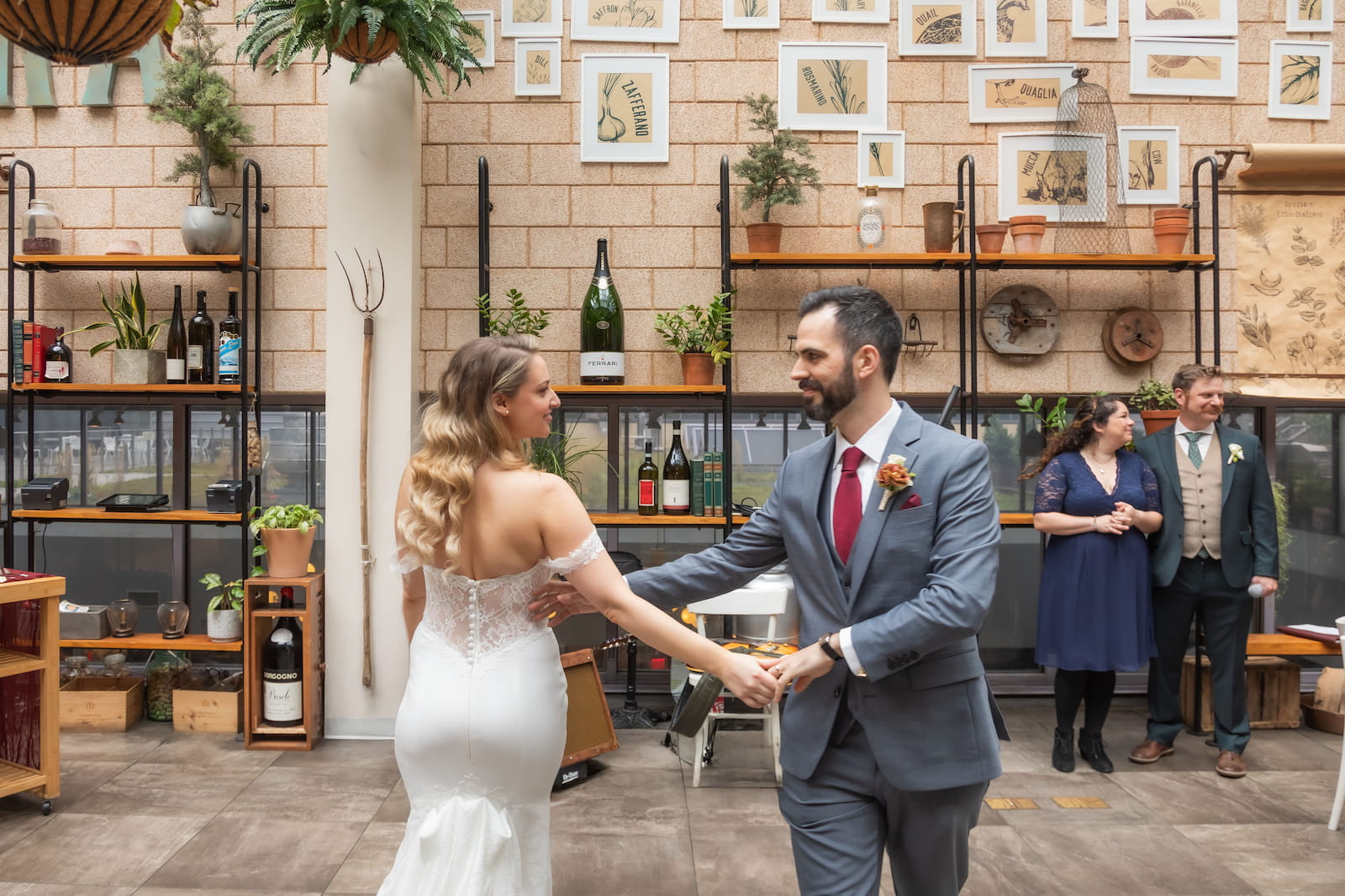 A bride and groom dance during their micro wedding reception at Terra at Eataly in Boston