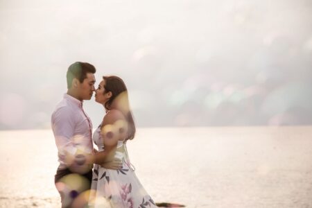 Engagement Session at Stage Fort Park | Gloucester, MA A couple surrounded by bubbles during an engagement session at Stage Fort Park in Gloucester, MA.