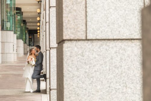 A romantic portrait of a bride and groom on their micro-wedding day in Boston