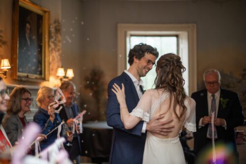 A bride and a groom during their first dance at the King's Chapel Parish House in Boston's Beacon Hill neighborhood.