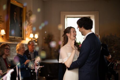A bride and a groom during their first dance at the King's Chapel Parish House in Boston's Beacon Hill neighborhood.